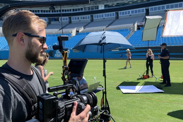 zach filming coach ron rivera of the carolina panthers with red helium and easyrig